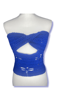 a blue crocheted top on a mannequin