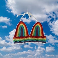 a crocheted rainbow bikini in the sky